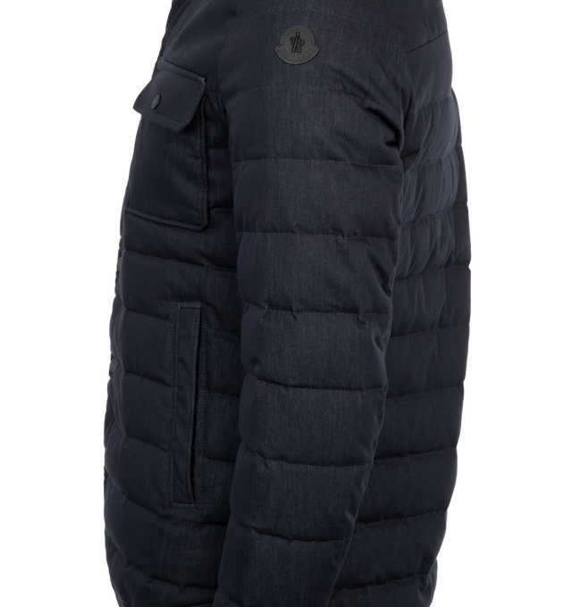 Image 3 of 3 - NAVY - Moncler Mirmandix Short Down Jacket has a spread collar, a 2-way zip front closure with a press stud placket, side pockets, chest patch pockets, silver-tone hardware, and a leather logo patch. Lined. Down and feather fill. 100% polyester. Made in Romania.