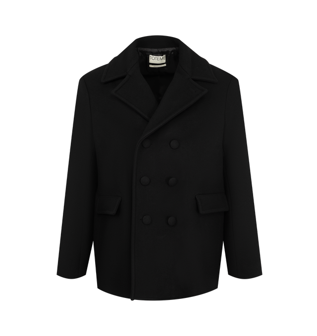 Image 1 of 3 - BLACK - Toteme Men's Trench Coat is crafted in wool featuring a double breasted button closure, two welt side pockets. Materials: 100% RWS Wool; Lining: 100% Viscose.