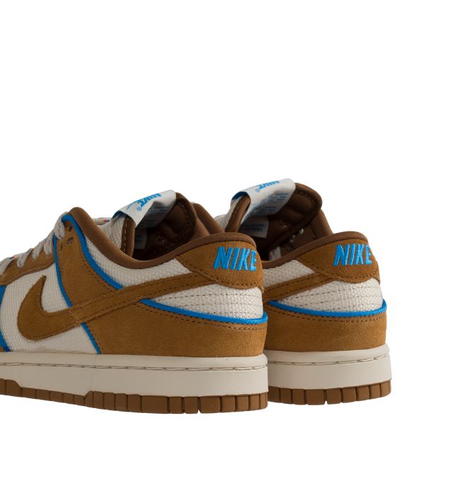 Image 3 of 5 - BROWN - NIKE Dunk Low Retro Premium in "British Tan" featuring padded, low-cut collar, aged upper, foam midsole and rubber outsole with classic hoops pivot circle. 