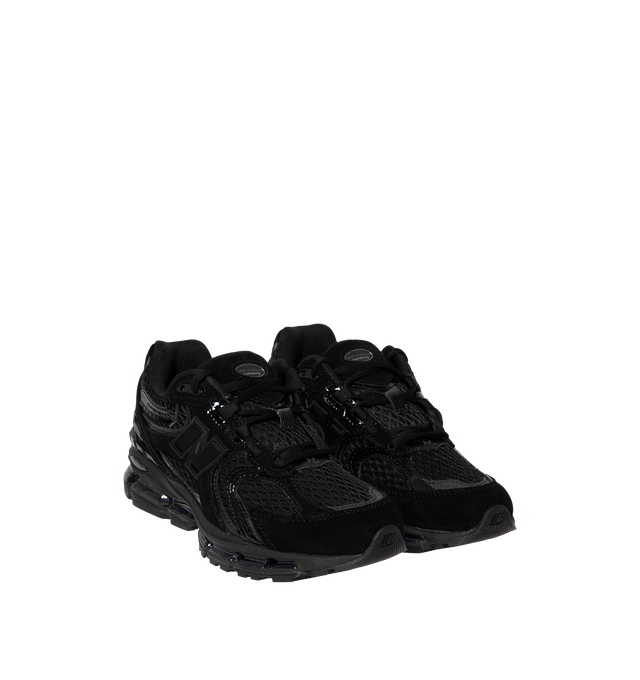Image 2 of 5 - BLACK - New Balance 1954R Unisex Sneakers feature a suede and mesh upper inspired by the 2002 and 1906 models, combining breathable mesh with synthetic and pig suede overlays. ABZORB midsole cushioning absorbs impact through a combination of cushioning and compression resistance, while a traditional lace-up closure provides an adjustable fit. Upper: Synthetic, Mesh, and Pig Suede.