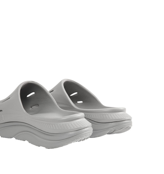 Image 3 of 4 - GREY - HOKA Ora Recovery Slide 3 featuring perforated rubber upper with EVA sole, slip-on styling and molded footbed.