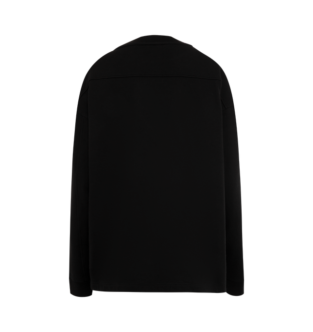 Image 2 of 2 - BLACK - THE ROW Amira Top featuring ribbed trim, side slits at hem, crew neck and long sleeves. 100% cotton. Made in Italy.