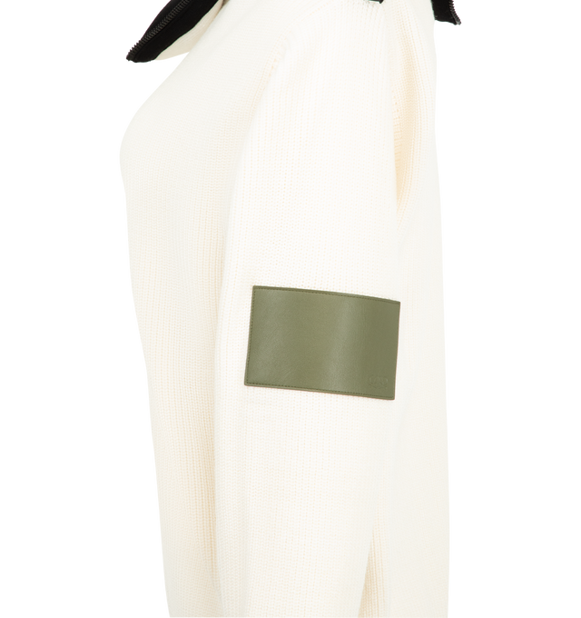 Image 3 of 3 - WHITE - Loewe Women's Sweater is crafted from medium-weight wool and features a relaxed-fit silhouette with a regular length. Designed with an asymmetric zip-up collar featuring a contrast reverse and a Double L embossed leather patch on the left sleeve. Main Material: 100% Wool. Made in Italy.