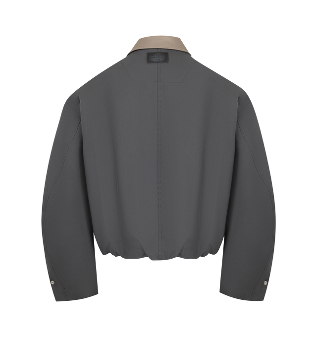 Image 3 of 3 - GREY - Acne Studios Men's Bomber with Leather Collar is crafted from smooth cotton satin and features a leather collar, snap-button front closure, and a regular-fit silhouette. Designed with a below-waist length, the bomber is detailed with zip side pockets, tab snap cuffs, a drawcord hem, and a leather logo patch at the back neckline. Main Material: 100% Cotton. Collar: 100% Cow Leather. Filling: 100% Polyester. Lining: 65% Polyester, 35% Cotton.