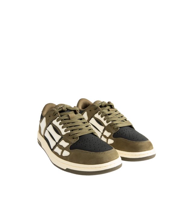 Image 2 of 5 - GREEN - Amiri Mens Skel Top Low Sneakers are crafted with a suede leather upper and signature pebbled leather bone appliqus. Feature contrast topstitching, lace-up closure, padded collar, two-tone rubber sole, and low-top silhouette. Main Material: Leather Upper; Sole: Rubber. Made in Vietnam.