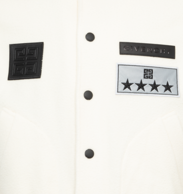 Image 3 of 3 - WHITE - GIVENCHY Varsity Jacket featuring GIVENCHY, 4G labels and reflective 4G Stars patch on the front, ribbed elasticated knit collar, cuffs and hem with contrasting stripes, snap closure, two side pockets and classic fit. 100% virgin wool. Details: 100% calfskin leather. Made in Portugal. 
