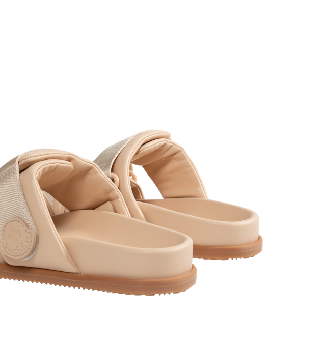 Image 3 of 4 - NEUTRAL - MONCLER Mon Summer Leather Crisscross Sandals featuring crisscross logo-stamped polyester strap, flat heel, dual band upper, slip-on style, molded footbed, rubber outsole. Lining: leather. Made in Italy.