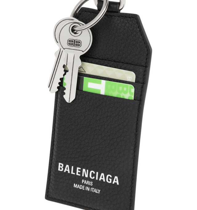 Image 3 of 3 - BLACK - BALENCIAGA Credit Keychain Card Holder featuring grained calfskin, keychain card holder, Balenciaga Paris logo debossed with foil at front, BB and Balenciaga logo engraved, aged-silver hardware, comes with 2 fake cards with logo printed, 1 snap hook, 3 card slots and 1 split ring with charms attached. Calfskin. Made in Italy.