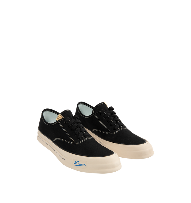 Image 2 of 5 - BLACK - VISVIM Logan Deck Lo Sipe Sneaker featuring Japanese high twist cotton canvas upper, rubber outsole, pigment free leather lining and cork insole for enhanced cushioning and moisture absorption.