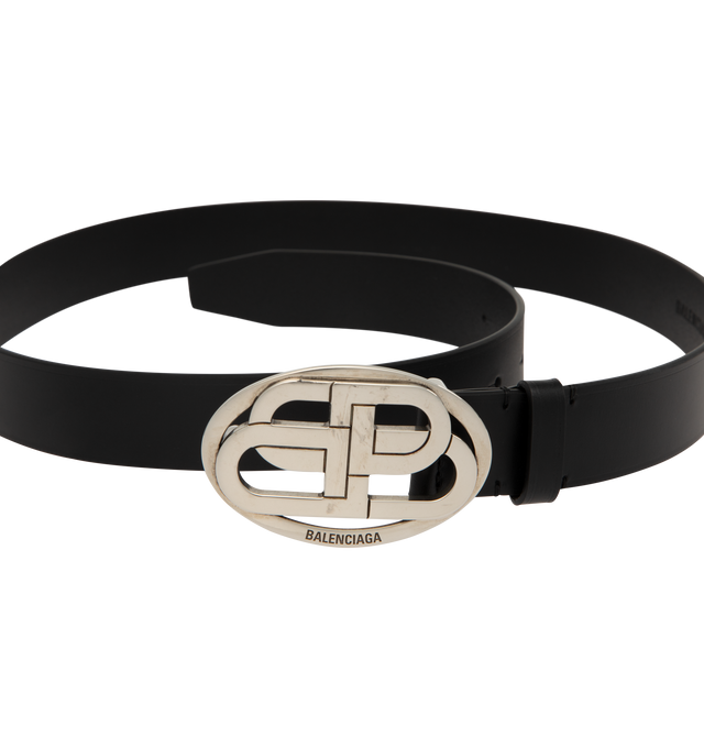 Image 2 of 2 - BLACK - Balenciaga Belt is crafted from natural calfskin leather. Features an aged-silver interlocked BB logo buckle, engraved Balenciaga logo, five adjustment holes, and a tonal leather keeper loop. Main Material: 100% Calf Leather. Made in Italy.