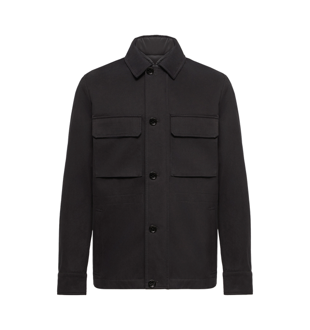 Image 1 of 1 - BLACK - Moncler Mens Thaldrik 3-in-1 Jacket is crafted from cotton and features a detachable AirSoft down-filled vest for versatile styling. Features a front zip and button closure, adjustable drawstring waist, zip pockets, interior patch and zip pockets, adjustable snap-button cuffs and hem, and a leather logo patch. Main Material: Jacket: 100% Cotton; Vest: 100% Polyester; Vest Fill: 90% Down, 10% Feather; Leather Trim: Cow Leather. Made in Romania.