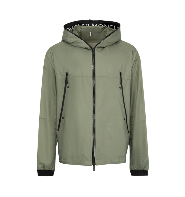 Image 1 of 3 - GREEN - Moncler Junichi Jacket is a funnel neck style with 2-way zipper closure, side zip pockets, and an applique designer emblem. 100% polyamide. Made in Romania.