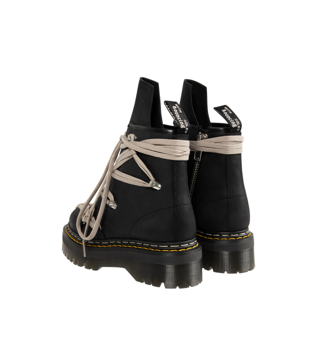 Image 3 of 4 - BLACK - RICK OWENS X DR. MARTENS Megalace Leather Platform Boots featuring signature megalacing system across the black, waxy leather upper with an extended geometric tongue, an easy-access inner zip, special edition AirWair heel loop and stacked on imposing Quad sole with a white and yellow double welt stitch.