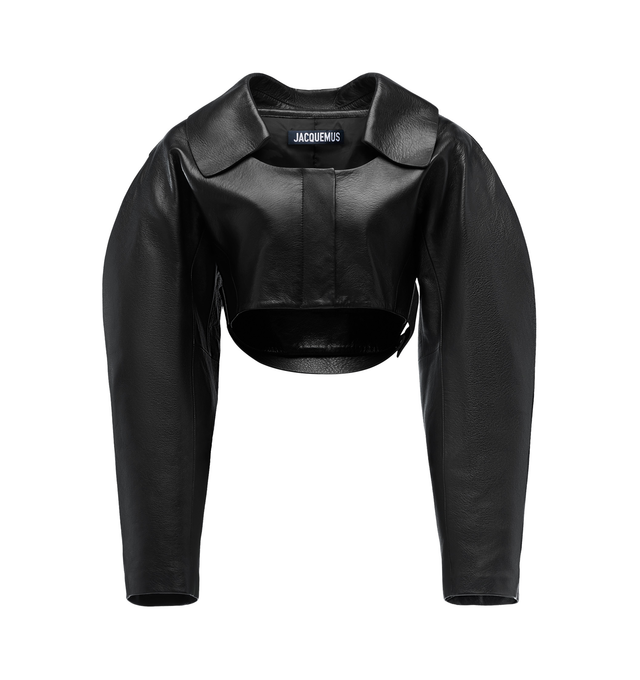 Image 1 of 1 - BLACK - JACQUEMUS Leather Bolero featuring cropped, round fit, soft grained leather, pointed collar with square neckline, rounded shoulders, zip closure with snap button placket, integrated belt with snaps in the back, J loop detail on the back yoke, golden hardware and fully lined. 100% lambskin. Lining: 100% viscose. Made in France. 
