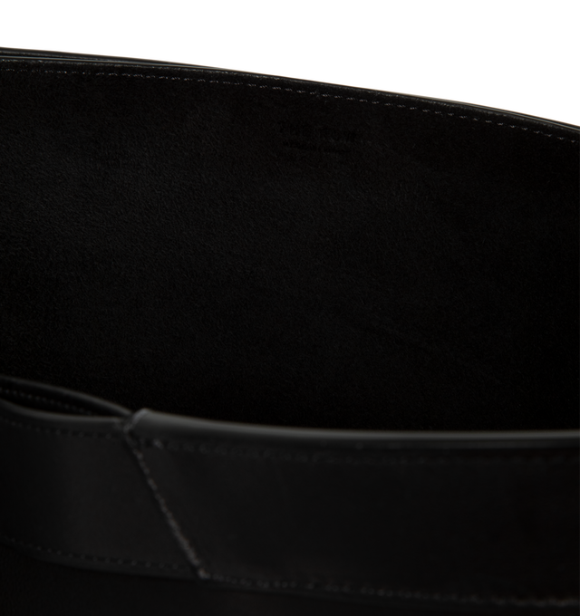 Image 3 of 3 - BLACK - The Row Women's Large Kit Tote Bag is crafted from finely grained calfskin leather and features a structured silhouette with a flat base, continuous leather trim, and integrated top handles. Designed for everyday versatility, this spacious carryall is fully lined in calfskin leather and includes a removable zip pouch for added organization. Main Material: 100% Calfskin Leather. Lining: 100% Calfskin Leather. Dimensions: 15.75 x 11.02 x 5.51 in. Handles: Built-In Leather Handles. Inter