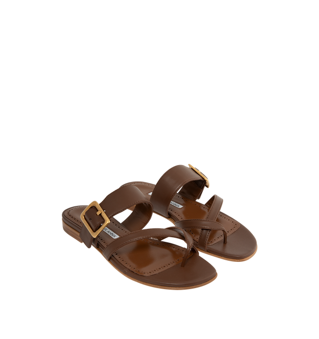 Image 2 of 4 - BROWN - Manolo Blahnik Thalusa nappa leather flat sandals featuring an open toe, crossover front straps with toe stem, instep strap with gold buckle design detail and flat stacked 10mm heel. Upper: 100% lamb nappa. Sole: 100% calf leather. Lining: 100% kid leather. Made in Italy.
