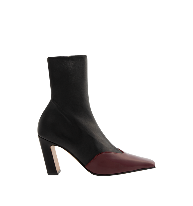 Image 1 of 4 - BLACK - KHAITE Nevada Stretch High Boot featuring a mid-calf urban cowboy boot with a squared toe, a stylized wingtip of glossy patent leather and side zipper closure. Heel Height: 3.4 in. Nappa with soft patent calf, 80% lambskin, 20% calfskin. Made in Italy.
