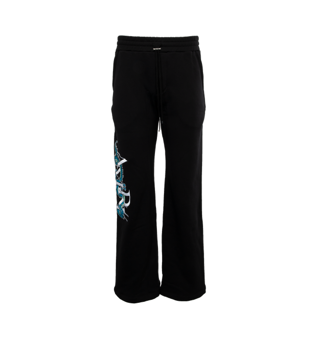 Image 1 of 5 - BLACK - AMIRI CNY Dragon Sweatpant featuring regular-fit, straight leg sweatpants, elasticized drawstring waistband, two pockets at sides, single pocket at back and graphic textured logo text and texts at sides. 100% cotton. 