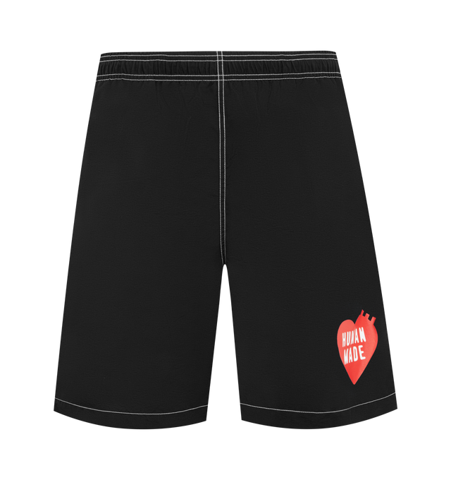Image 1 of 3 - BLACK - HUMAN MADE Swim Shorts featuring elasticated waistband, 2 side pockets, contrast stitching and embroidered branding. 100% nylon.