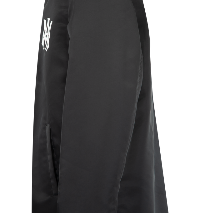 Image 3 of 3 - BLACK - AMIRI MA Coach Jacket featuring water-resistant nylon, classic snap button-down construction, snap button wrist closure, side pockets and MA detailing. 100% nylon. Made in Italy.