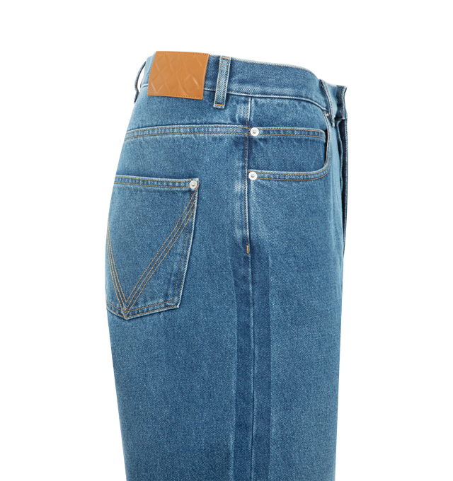 Image 3 of 3 - BLUE - Medium Indigo Turned-Up Jeans featuring wide leg, turned-up hem, embossed Intrecciato leather patch and button closure. 100% cotton. Made in Italy.