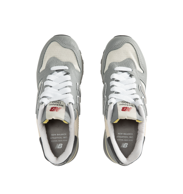 Image 5 of 5 - GREY - New Balance Mens Made in USA 1300 Sneakers feature a mesh upper with premium leather and hairy suede overlays. Designed with full-length ENCAP midsole cushioning, durable tread outsole, woven "1300" tongue label, and a classic lace-up silhouette. Upper: Mesh, Leather, and Hairy Suede; Midsole: ENCAP Foam and Polyurethane. Made in the USA.