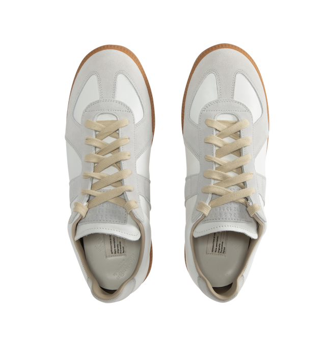 Image 5 of 6 - WHITE - Maison Margiela Replica Sneakers featuring lace-up sneakers in buffed nappa calfskin and calfskin suede, contrasting sole, Maison Margiela logo label on the tab, internal Replica label, internal elastic and all-over Maison Margiela logo insole. 100% calf leather. Sole: 100% rubber. Made in Italy.
