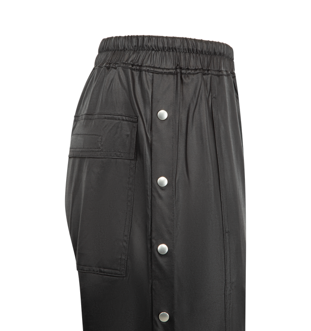Image 3 of 4 - BLACK - DRKSHDW Wide Pusher Pants featuring relaxed liquid-jersey pants, snaps along the side seams, wide-leg silhouette, elastic drawstring waist, side-seam pockets and back hook-and-loop flap patch pockets. 80% acetate, 20% nylon. Made in Italy.
