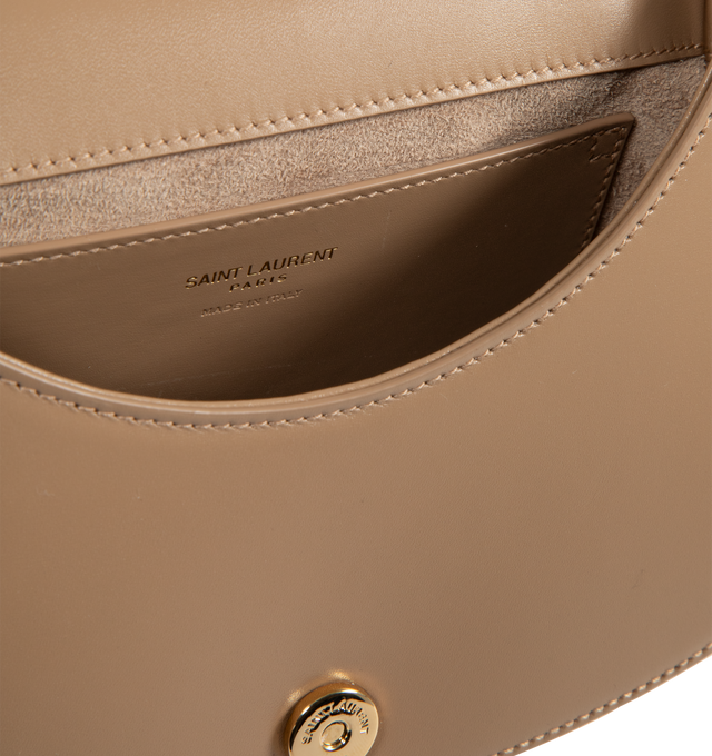 Image 3 of 3 - BROWN - Saint Laurent YSL Adjustable Handle Bag has an adjustable handle for hand or shoulder carrying, a signature logo, bronze-tone hardware, magnetic snap closure, and 1 interior pocket. Suede lining. 6.9 x 8.3 x 3.1 inches. 100% lambskin. Made in Italy.