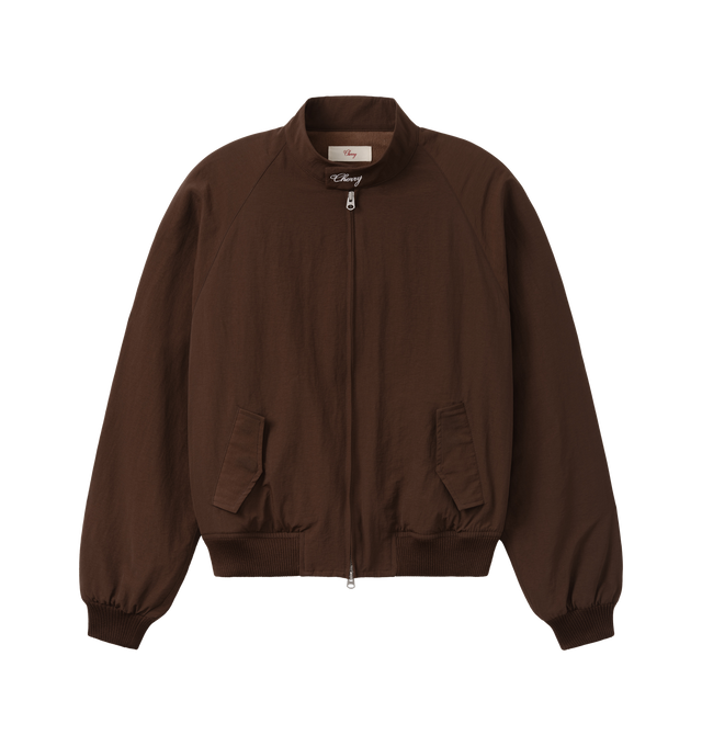 Image 1 of 7 - BROWN - Cherry LA Nylon Championship Jacket is crafted from nylon and features a regular-fit silhouette, a front nickel zip closure, and rib-knit cuffs and hem. Designed with a brushed cotton lining, welt pockets with hidden snap closures, and embroidered detailing at the neck and center back, this lightweight jacket draws inspiration from classic championship styles with a contemporary finish. Main Material: Nylon. Lining: Brushed Cotton. Made in Los Angeles, USA.