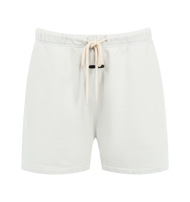 Image 1 of 3 - WHITE - Fear of God Essentials Womens Classic Sweatshorts are crafted from heavyweight cotton fleece with a pigment-dyed finish. Feature a relaxed classic fit, elasticized waistband with adjustable drawcord and bungee, side-seam pockets, and signature Essentials label. Main Material: 100% Cotton. Imported.