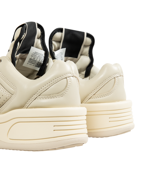 Image 3 of 5 - WHITE - Rick Owens DRKSHDW x Converse TURBOWPN Ox Sneakers featuring low-top, buffed leather, perforated detailing at toe and sides, lace-up closure, logo flag at extended padded tongue, padded collar, logo cutout at sides, buffed faux-leather lining and treaded rubber platform sole.