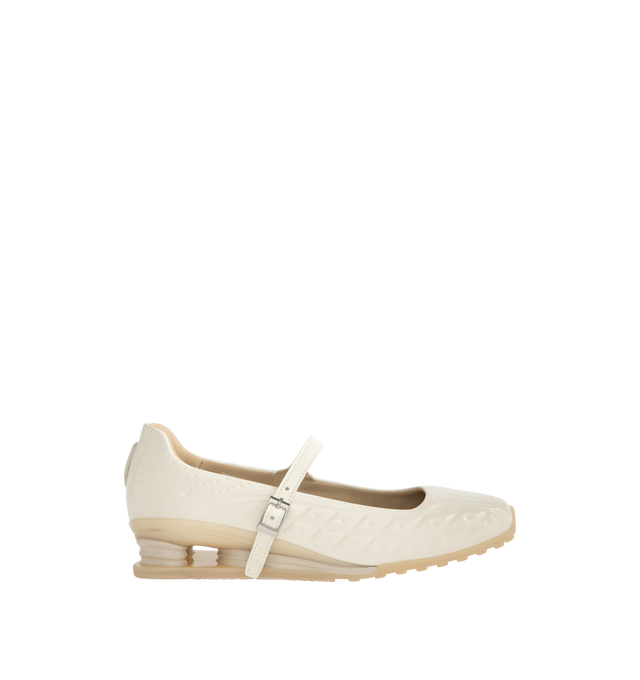 Image 1 of 5 - NEUTRAL - Nike Womens Shox Z Calistra Sneakers feature a molded synthetic leather upper. Designed with an adjustable midfoot strap, Nike Shox Z cushioning pillars, signature Nike and Shox branding, and durable rubber outsole. Upper: Synthetic Leather; Cushioning: Nike Shox Z; Outsole: Rubber. Imported