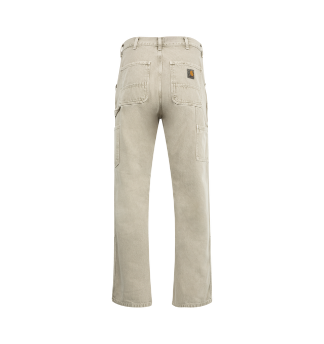 Image 2 of 3 - NEUTRAL - CARHARTT WIP Double Knee Pant featuring classic work pant silhouettes, a regular waist, relaxed straight fit, zip fly, double-layer knees, Bartack stitching at vital stress points, rivet details, tool pockets, and a hammer loop. 100% organic cotton.