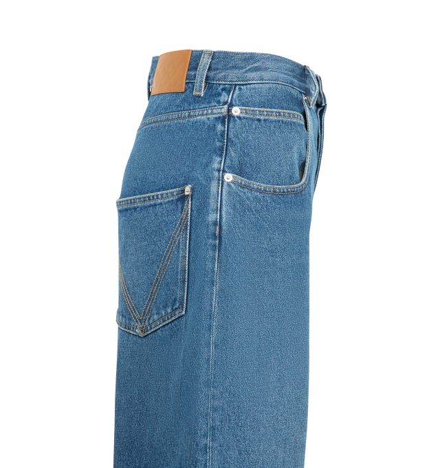 Image 3 of 3 - BLUE - Bottega Veneta Women's Medium Indigo Wide Leg Jeans are crafted from medium indigo washed denim and feature a high-rise waist with a wide-leg silhouette. Main Material: 100% Cotton. Rise: High Waist. Leg: Wide Leg. Closure: Button Closure. Made in Italy.