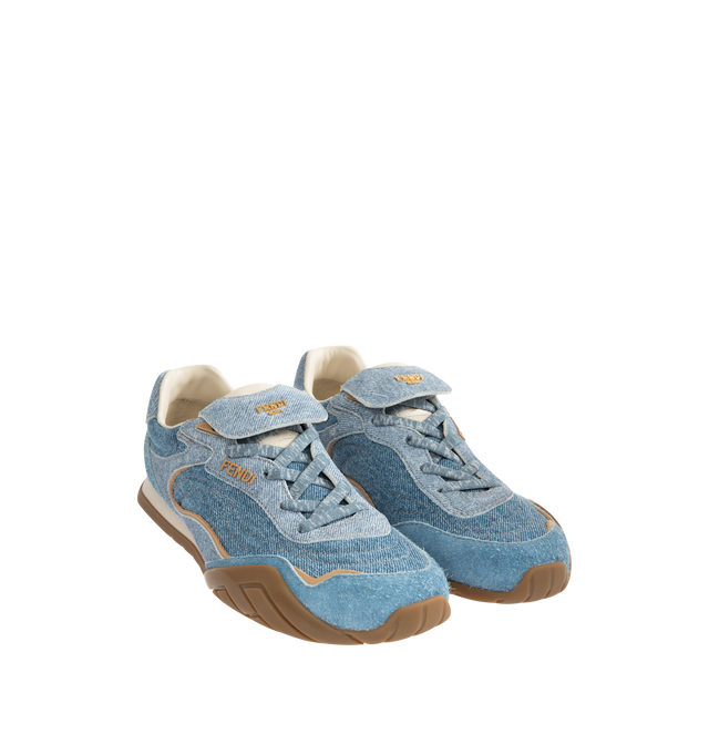 Image 2 of 5 - BLUE - FENDI Wave Pulse Sneaker featuring low-top, lace-up, suede and denim with and tone-on-tone suede-effect printed details, inserts and folded tongue made of the same material, mlange tubular laces, three-dimensional rubber logo on the side, gold-colored metal Fendi logo on the tongue, rubber running sole with wraparound edge on the side and diagonal F motif. 100% calfskin. Inside: 100% lambskin. Made in Italy.