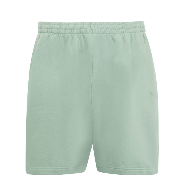 Image 1 of 3 - GREEN - BALENCIAGA Back Reflective Shorts featuring dry fleece, mid-waist, elasticated waistband, drawstring waist, 2 slash pockets at front, Balenciaga Back logo embroidered on left front leg and reflective effect artwork. 100% cotton. Made in Portugal.