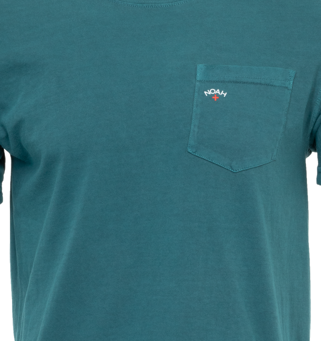 Image 2 of 2 - BLUE - NOAH Core Logo Pocket T-shirt featuring logo print at the chest, crew neck, short sleeves, chest patch pocket and straight hem. 100% cotton.  