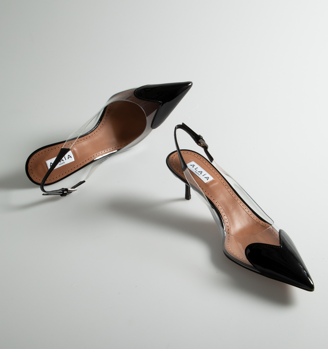 Image 6 of 6 - BLACK - ALAIA Heart Slingbacks in Patent Lambskin featuring clear vamp, pointy cap toe with a patent-leather heart and adjustable slingback strap with buckle closure. 55MM. Leather and synthetic upper. Leather lining. Leather and rubber sole. Made in Italy.