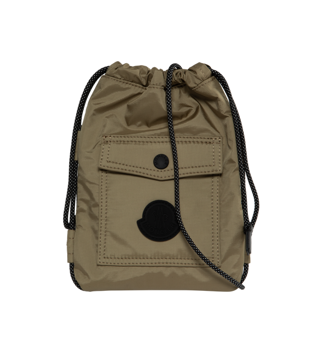Image 1 of 3 - GREEN - MONCLER Makaio Drawstring Bag featuring water-repellent nylon lining, leather trim, climbing cord drawstring closure, outer pocket, inner media pocket, climbing cord shoulder strap and silicone logo patch. L 18 cm x H 23 cm x W 2 cm. 100% polyamide/nylon. 