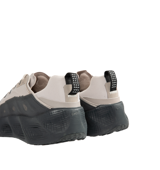 Image 3 of 5 - GREY - NIKE Ava Rover Sneaker featuring a stacked ReactX midsole, ultralight outsole, breathable upper, mudguards wrap around the lightweight upper to help you feel locked in, perforations on the top of the shoe enhance breathability, oversized midsole made with performance-level ReactX foam for ultra-comfortable cushioning, a thin layer of rubber on the outsole and reflective finish.
