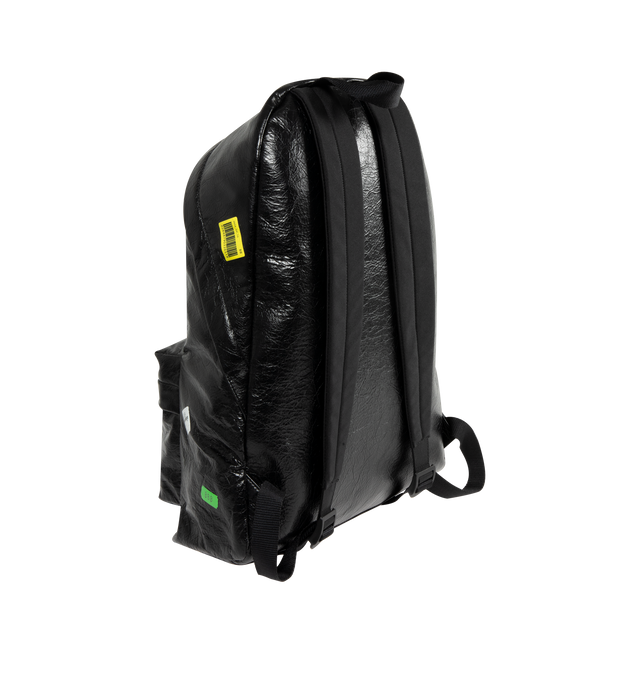 Image 2 of 3 - BLACK - BALENCIAGA Explorer Backpack featuring arena lambskin with printed stickers, one top handle, adjustable shoulder straps, Balenciaga logo debossed and printed at front, matte black hardware, top double-ended zip-fastening closure, front zipped pocket, 1 inner zipped pocket, 1 inner patch pocket, BB logo engraved zipper puller with cotton string and cotton canvas lining. L13.7 x H18.5 x W7.8 inch. Lambskin, calfskin, polyester, polyamide. Made in Italy.