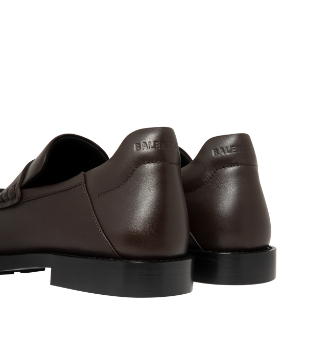 Image 3 of 4 - BROWN - Balenciaga Womens Comfy Loafers are crafted from smooth moka leather. Feature a slip-on silhouette, round toe, metallic detail across the vamp, thick sole, and leather construction designed to develop a natural patina over time. Main Material: Leather; Sole: Leather. Made in Italy.