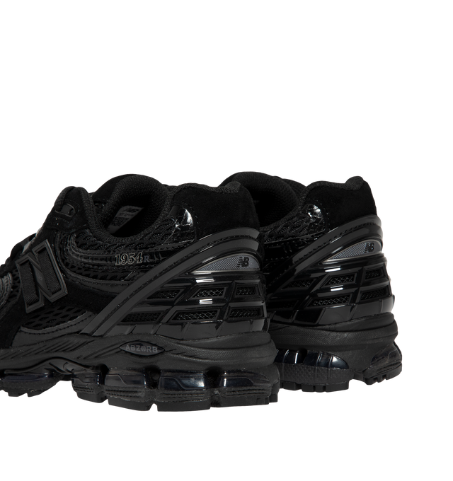 Image 3 of 5 - BLACK - New Balance 1954R Unisex Sneakers feature a suede and mesh upper inspired by the 2002 and 1906 models, combining breathable mesh with synthetic and pig suede overlays. ABZORB midsole cushioning absorbs impact through a combination of cushioning and compression resistance, while a traditional lace-up closure provides an adjustable fit. Upper: Synthetic, Mesh, and Pig Suede.