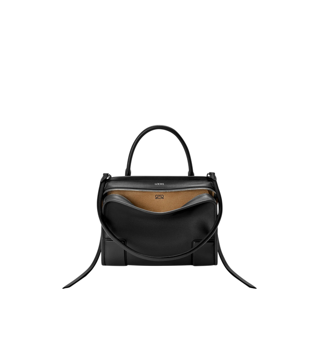 Image 5 of 17 - BLACK - Loewe Amazona Medium 180 Bag in soft calfskin leather featuring a relaxed silhouette with a single toron top handle, designed to be carried open, while a concealed closure secures the main compartment, removable shoulder and crossbody straps, zip closure with two leather zip pullers, two compartments, main compartment closed with magnetic closure, internal flat pocket, suede lining and embossed logo. Soft calfskin. Strap length 108 cm; Strap Drop 50 cm; Handle drop 11 - 28 cm; Height
