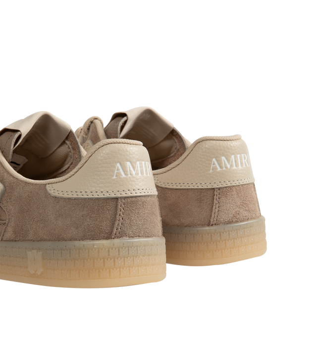 Image 3 of 5 - BROWN - Amiri Pacific Bones Sneakers are a lace-up style with leather bone appliques and rubber soles. Leather and rubber. Made in China.