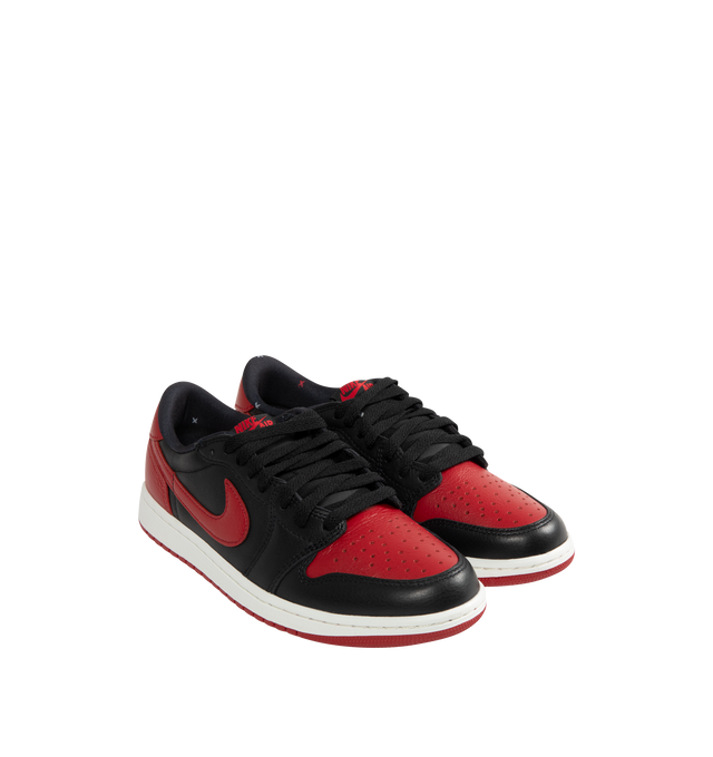 Image 2 of 5 - MULTI - Men's Air Jordan 1 Retro Low OG Sneakers feature a smooth leather upper with the iconic low-top silhouette and signature X graphics on the heel, honoring one of the most legendary colorways in Jordan history. These lifestyle sneakers combine encapsulated Air-Sole cushioning, a responsive foam midsole, and a durable rubber outsole for lightweight comfort, lasting support, and reliable everyday traction. Main Material: Leather. Midsole: Foam with Encapsulated Air-Sole Unit. Sole: Rubber