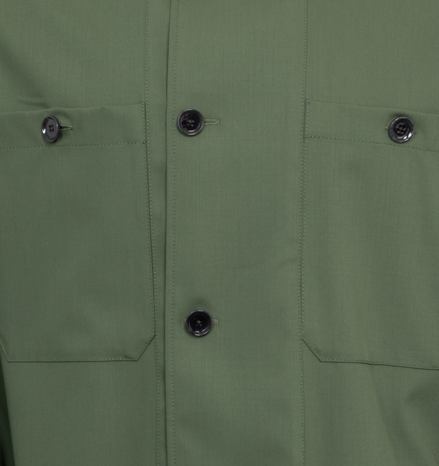 Image 3 of 3 - GREEN - LEMAIRE Soft Military Overshirt featuring loose fit, workwear collar, double back yoke, buttoned cuffs, large overlapping plackets on the center front and two buttoned chest pockets. 100% virgin wool. Made in Hungary. 