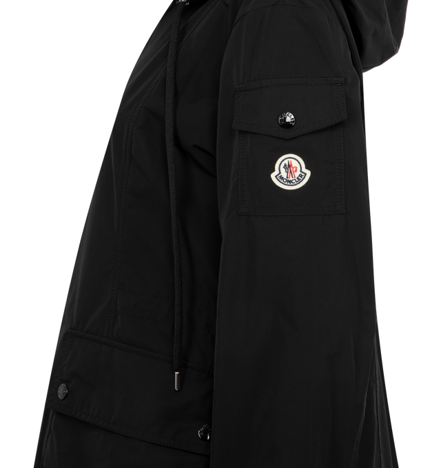 Image 3 of 3 - BLACK - MONCLER Leandro Parka featuring adjustable hood, zipper closure, patch pockets with snap button closure, sleeve pocket and waistband with drawstring fastening. 60% polyester, 40% cotton.