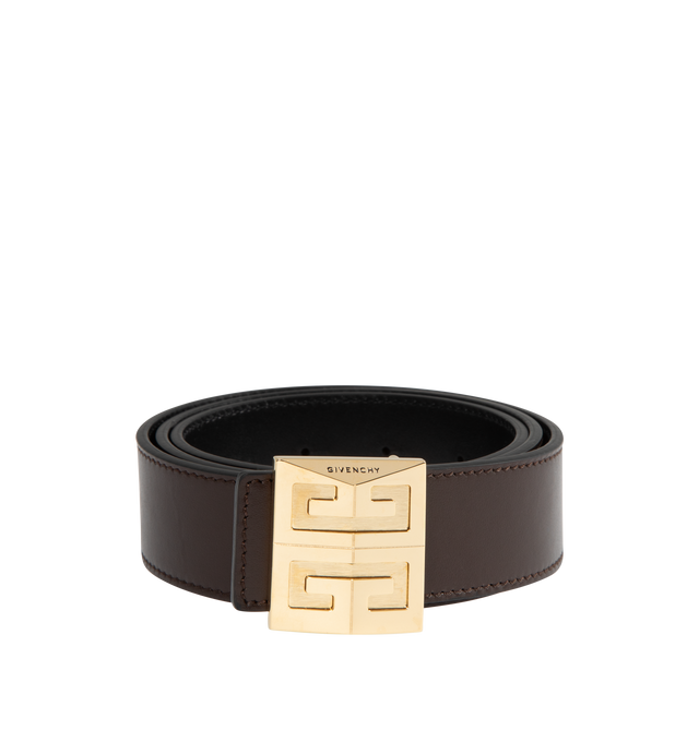 Image 1 of 2 - BLACK - GIVENCHY 4G REVERSIBLE BELT 35MM featuring brown/black reversible sides, smooth calfskin leather, 4G metal buckle in golden-finish with engraved GIVENCHY signature and contrasting smooth leather lining. Width: 1.4 in. 100% calfskin leather.  